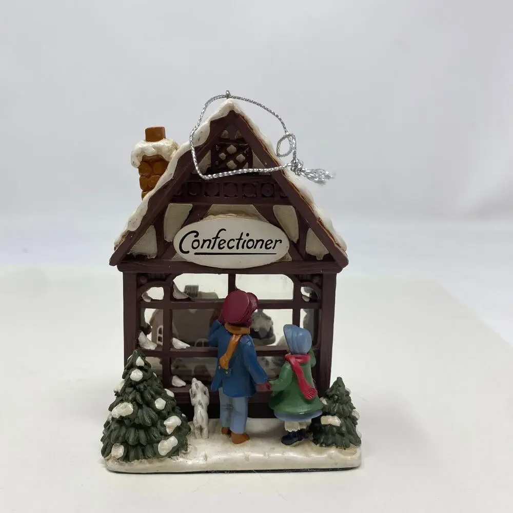Confectioner bakery shop window Christmas ornament peek a boo children puppy
